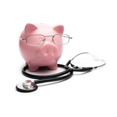 Piggy bank with stethoscope isolated on white- Stock Photo or Stock Video of rcfotostock | RC-Photo-Stock