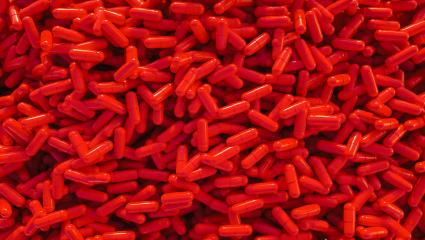 pile of red medical pills or capsules- Stock Photo or Stock Video of rcfotostock | RC Photo Stock