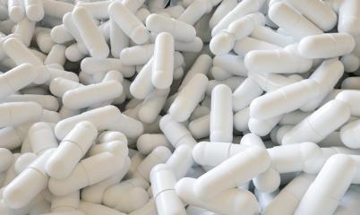 pile of white pills or capsules- Stock Photo or Stock Video of rcfotostock | RC Photo Stock