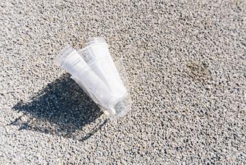 Plastic cups pollution on a street at the city- Stock Photo or Stock Video of rcfotostock | RC-Photo-Stock
