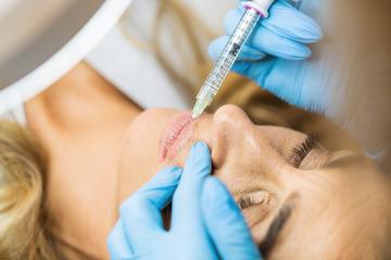 Plastic Surgery. Young Woman Receiving Anti-aging face Injection : Stock Photo or Stock Video Download rcfotostock photos, images and assets rcfotostock | RC Photo Stock.: