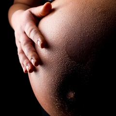 Pregnant woman belly with waterdrops and heart shape- Stock Photo or Stock Video of rcfotostock | RC Photo Stock