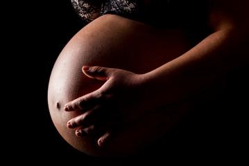 Pregnant woman caressing her belly - Stock Photo or Stock Video of rcfotostock | RC-Photo-Stock