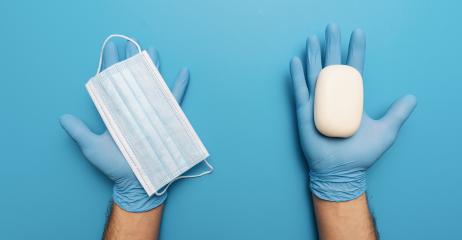 Products to stay safe during pandemic covid19 quarantine. Hands in blue gloves holding sanitiser gel, soap, medical face masks on blue abstract background. Protection against coronavirus, banner size- Stock Photo or Stock Video of rcfotostock | RC-Photo-Stock