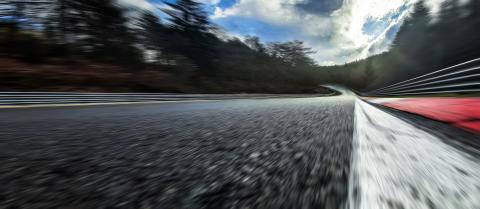 Race Car / motorcycle racetrack after rain on a cloudy mixed weather day.- Stock Photo or Stock Video of rcfotostock | RC Photo Stock