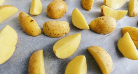 raw potato wedges on baking tray - Stock Photo or Stock Video of rcfotostock | RC Photo Stock