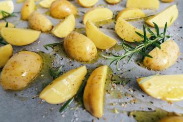 raw potato wedges with oil on baking tray - Stock Photo or Stock Video of rcfotostock | RC-Photo-Stock