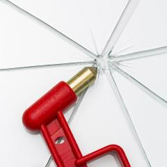 red emergency hammer with breaked glass window rescue hammer on white background- Stock Photo or Stock Video of rcfotostock | RC Photo Stock