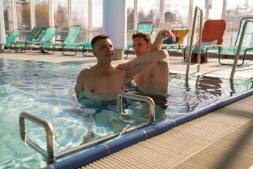 Rehabilitation session in a pool with a therapist and patient at : Stock Photo or Stock Video Download rcfotostock photos, images and assets rcfotostock | RC Photo Stock.: