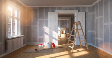 Room in renovation in elegant apartment for relocation with paint bucket and Flattened drywall wall- Stock Photo or Stock Video of rcfotostock | RC Photo Stock