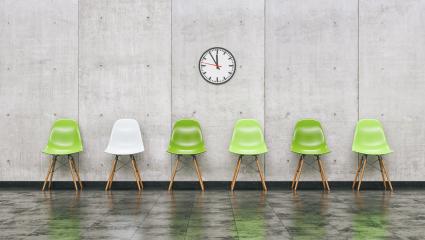 Row of green chairs in a waiting room with wall clock, business concept image - 3D rendering- Stock Photo or Stock Video of rcfotostock | RC Photo Stock
