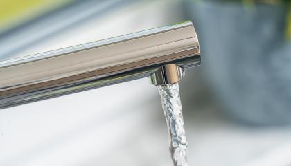 Running water out of modern faucet : Stock Photo or Stock Video Download rcfotostock photos, images and assets rcfotostock | RC-Photo-Stock.: