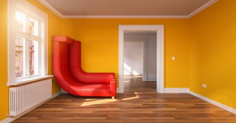 Saving space in small room with bending red sofa on a yellow wall- Stock Photo or Stock Video of rcfotostock | RC Photo Stock