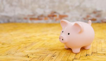 Saving to buy a house or home savings concept with piggy bank in house : Stock Photo or Stock Video Download rcfotostock photos, images and assets rcfotostock | RC-Photo-Stock.: