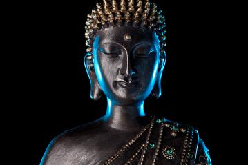 serene Buddha statue with a dark metallic finish, illuminated with soft blue lighting, detailed with intricate beads on the robe, set against a black background. : Stock Photo or Stock Video Download rcfotostock photos, images and assets rcfotostock | RC Photo Stock.: