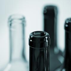 several wine glass bottles in blue color- Stock Photo or Stock Video of rcfotostock | RC Photo Stock
