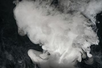 Smoke from a e-cigarette isolated on black background- Stock Photo or Stock Video of rcfotostock | RC-Photo-Stock