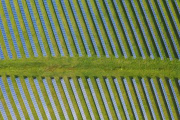 Solar panel produces green, environmentally friendly energy from the sun. Drone Shot- Stock Photo or Stock Video of rcfotostock | RC Photo Stock