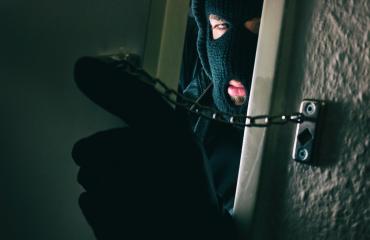 Stalker sneaking into a victim's home door : Stock Photo or Stock Video Download rcfotostock photos, images and assets rcfotostock | RC Photo Stock.: