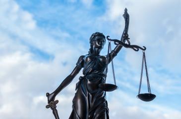 Statue of Justice symbol with cloudy sky background- Stock Photo or Stock Video of rcfotostock | RC-Photo-Stock