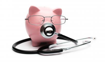 stethoscope and piggy bank showing medical or financial concept- Stock Photo or Stock Video of rcfotostock | RC Photo Stock