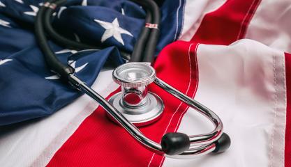 Stethoscope on American national flag - medicine concept image- Stock Photo or Stock Video of rcfotostock | RC Photo Stock