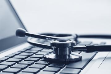 stethoscope on laptop keyboard including copy space- Stock Photo or Stock Video of rcfotostock | RC-Photo-Stock