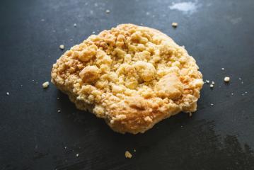 streusel bun or roll on old table- Stock Photo or Stock Video of rcfotostock | RC Photo Stock