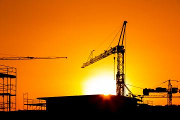 Sunset behind a Construction site silhouette building with cranes : Stock Photo or Stock Video Download rcfotostock photos, images and assets rcfotostock | RC Photo Stock.:
