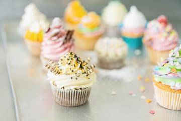 Tasty cupcakes on a metal sheet table in confectionery  : Stock Photo or Stock Video Download rcfotostock photos, images and assets rcfotostock | RC Photo Stock.: