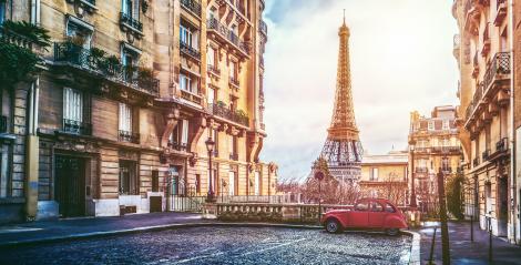 The eifel tower in Paris from a tiny street : Stock Photo or Stock Video Download rcfotostock photos, images and assets rcfotostock | RC-Photo-Stock.:
