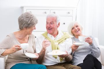 Three cheerful elderly friends enjoying tea and cake in a cozy indoor setting, sharing laughter and companionship, creating a warm and inviting atmosphere of friendship and happiness : Stock Photo or Stock Video Download rcfotostock photos, images and assets rcfotostock | RC Photo Stock.:
