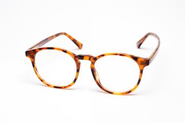 Tortoiseshell round eyeglasses on white
- Stock Photo or Stock Video of rcfotostock | RC Photo Stock