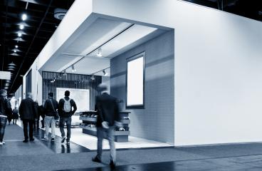 Trade show visitors walking at Trade Fair booths : Stock Photo or Stock Video Download rcfotostock photos, images and assets rcfotostock | RC Photo Stock.: