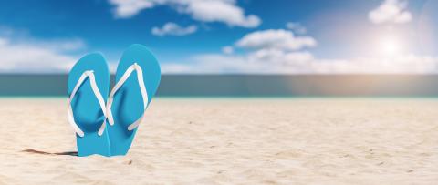 Two blue flip-flop sandals on a tropical beach on summer vacation, travel Concept image- Stock Photo or Stock Video of rcfotostock | RC Photo Stock