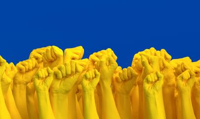 Ukraine People clenched fists punch air to Fight Back against Russia and Defend Freedom at War in Ukrainian Flag colors : Stock Photo or Stock Video Download rcfotostock photos, images and assets rcfotostock | RC-Photo-Stock.: