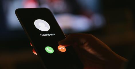 Unknown number calling in the middle of the night. Phone call from stranger. Person holding mobile and smartphone in livingroom late. Unexpected call disturbs at night.- Stock Photo or Stock Video of rcfotostock | RC-Photo-Stock