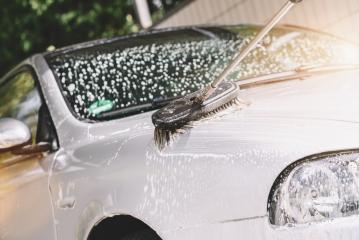Using a brush to wash a car at a car wash station- Stock Photo or Stock Video of rcfotostock | RC-Photo-Stock