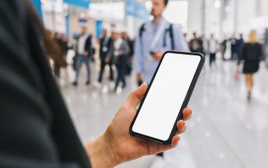 view of phone in female hands with empty screen, with crowd of people, copyspace for your individual text.- Stock Photo or Stock Video of rcfotostock | RC-Photo-Stock