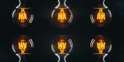 Vintage lightbulb on dark background- Stock Photo or Stock Video of rcfotostock | RC Photo Stock