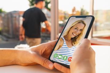 Virtual talking with friends, colleague and using video chat conference. Remote learning or work. Home quarantine or prevention of coronavirus infection (virus covid-19). Woman using smartphone. - Stock Photo or Stock Video of rcfotostock | RC Photo Stock