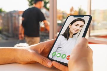 Virtual talking with friends, colleague and using video chat conference. Remote learning or work. Home quarantine or prevention of coronavirus infection (virus covid-19). Woman using smartphone. - Stock Photo or Stock Video of rcfotostock | RC-Photo-Stock