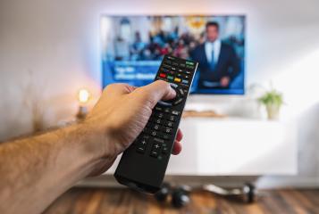 Watching TV and using remote controller to zap channels, pov shot : Stock Photo or Stock Video Download rcfotostock photos, images and assets rcfotostock | RC Photo Stock.: