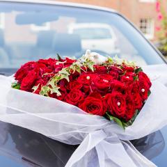 Wedding rose bouquet on wedding car- Stock Photo or Stock Video of rcfotostock | RC Photo Stock