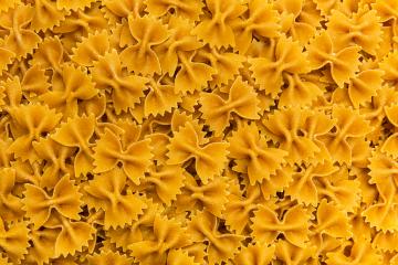 Wholemeal farfalle texture background- Stock Photo or Stock Video of rcfotostock | RC Photo Stock