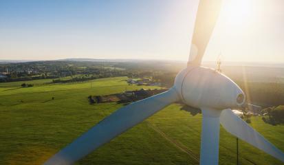 Wind turbine and agricultural fields - Energy Production with clean and Renewable Energy - copyspace for your individual text- Stock Photo or Stock Video of rcfotostock | RC Photo Stock