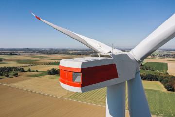 Wind turbine and agricultural fields on a summer day - Energy Production with clean and Renewable Energy - aerial shot- Stock Photo or Stock Video of rcfotostock | RC-Photo-Stock