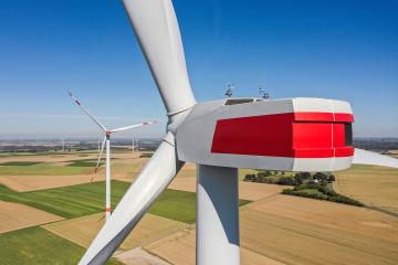 Wind turbine from aerial view - Sustainable development, environment friendly, renewable energy concept.- Stock Photo or Stock Video of rcfotostock | RC-Photo-Stock
