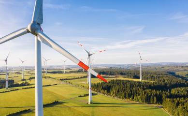 Wind turbine from aerial view - Sustainable development, environment friendly, renewable energy concept.- Stock Photo or Stock Video of rcfotostock | RC Photo Stock