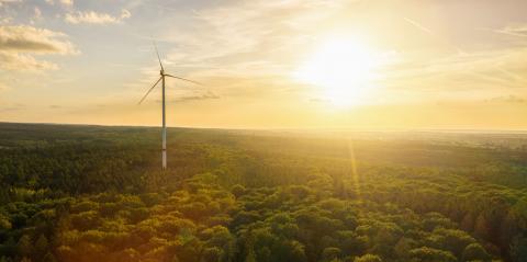 Wind Turbine in the sunset seen from an aerial view - Energy Production with clean and Renewable Energy- Stock Photo or Stock Video of rcfotostock | RC Photo Stock
